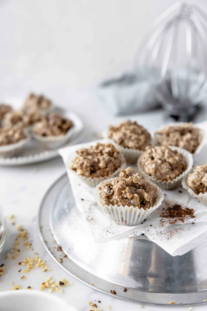 A tray of oatmeal muffins on a table.