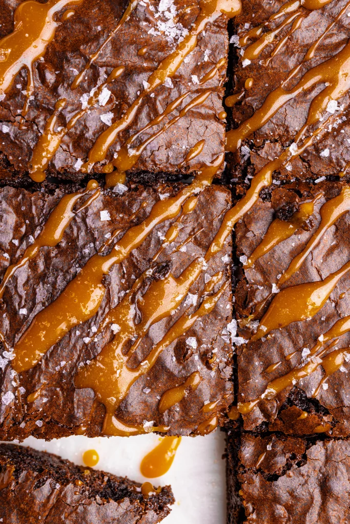 Sliced Freshly baked chocolate brownies drizzled with caramel
